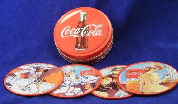 COCA  COLA COASTERS WITH TIN SET OF 4 DATED 1999  