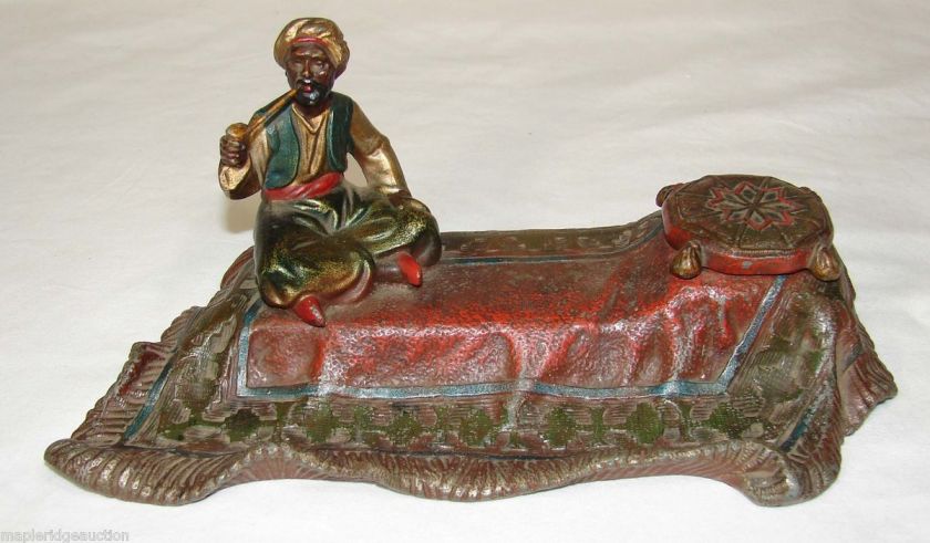   Austrian Arab on Magic Carpet Inkwell, Carpet Seller? Smoking Pipe