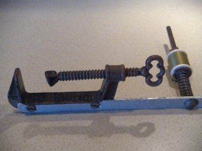 ANTIQUE EC STEARNS CLAMP W/ FLY FISHING STRING TYING